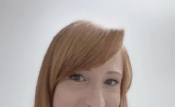 A woman looking at the camera